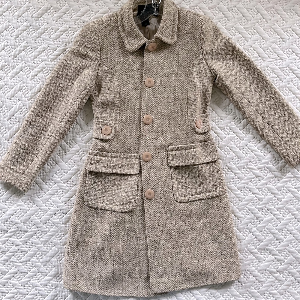 Used cream and golden coat by Victoria’s Secret moda international size 4